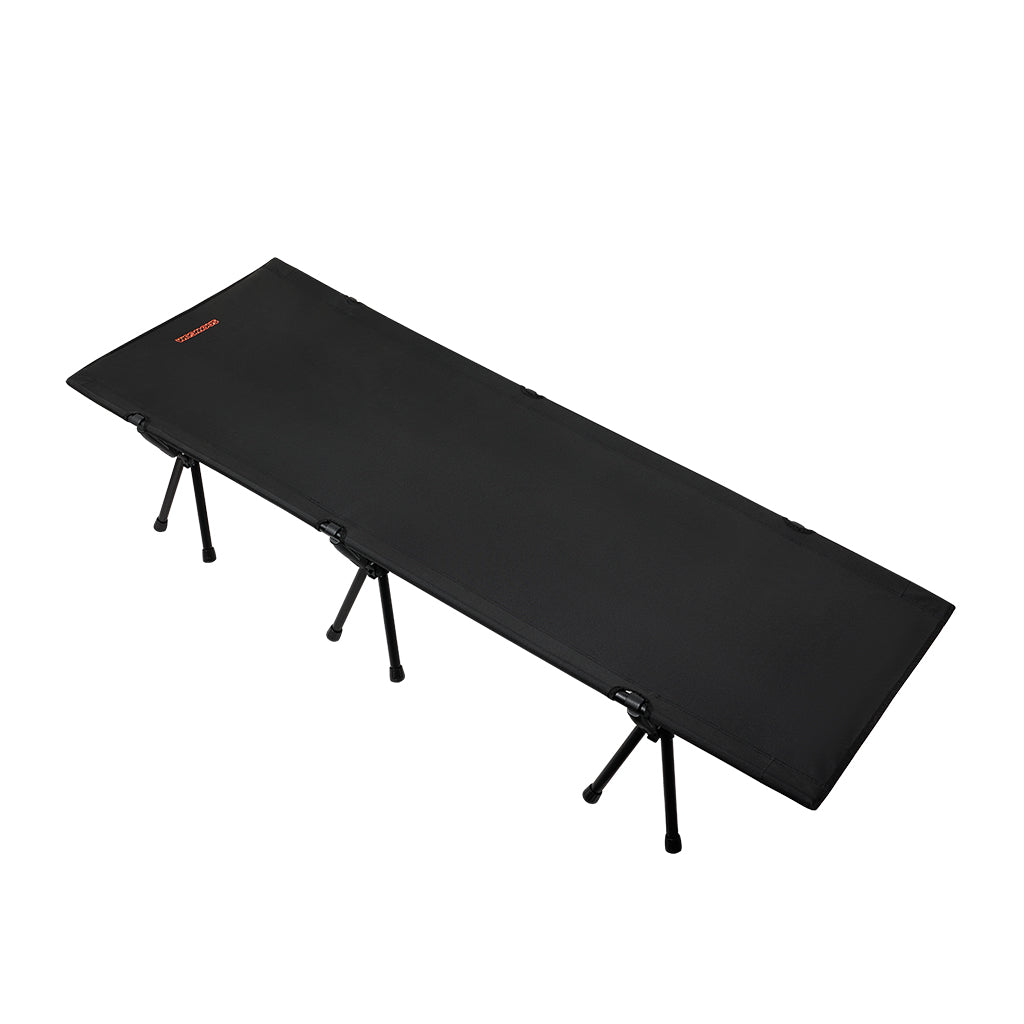 Black camping stretcher with legs on a white background