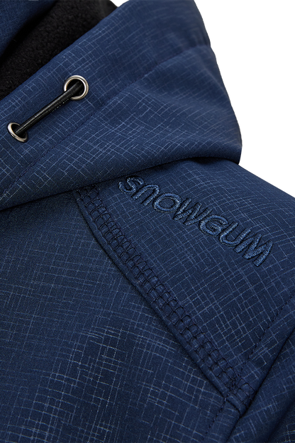 Close-up of a blue jacket with 'Snowgum' branding on a white background